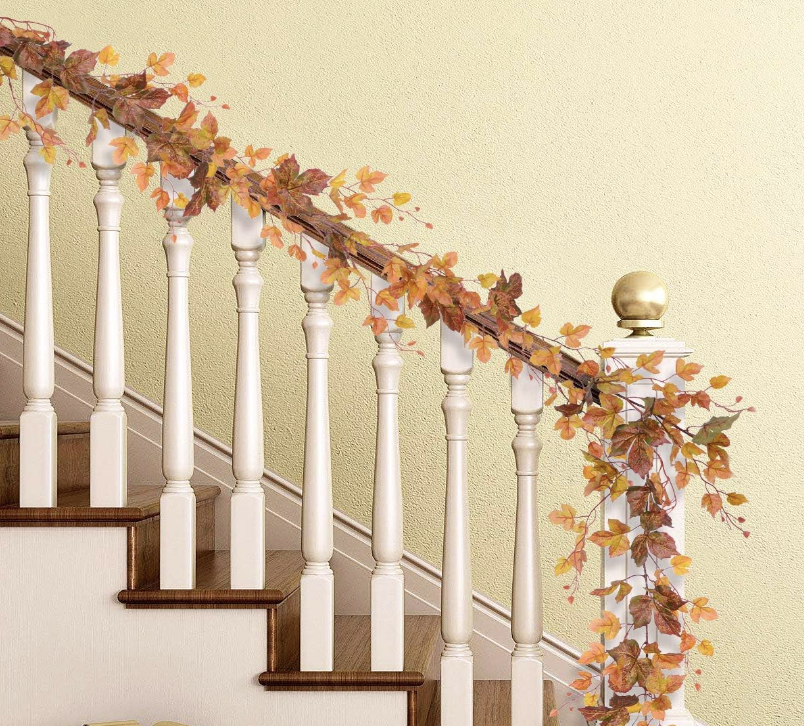 leaf garland wrapped aroud stair railing