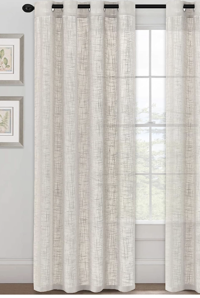 textured linen curtains on a window. 