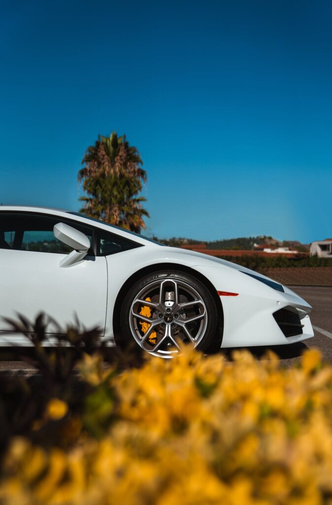 White Sports Car Parked Outside